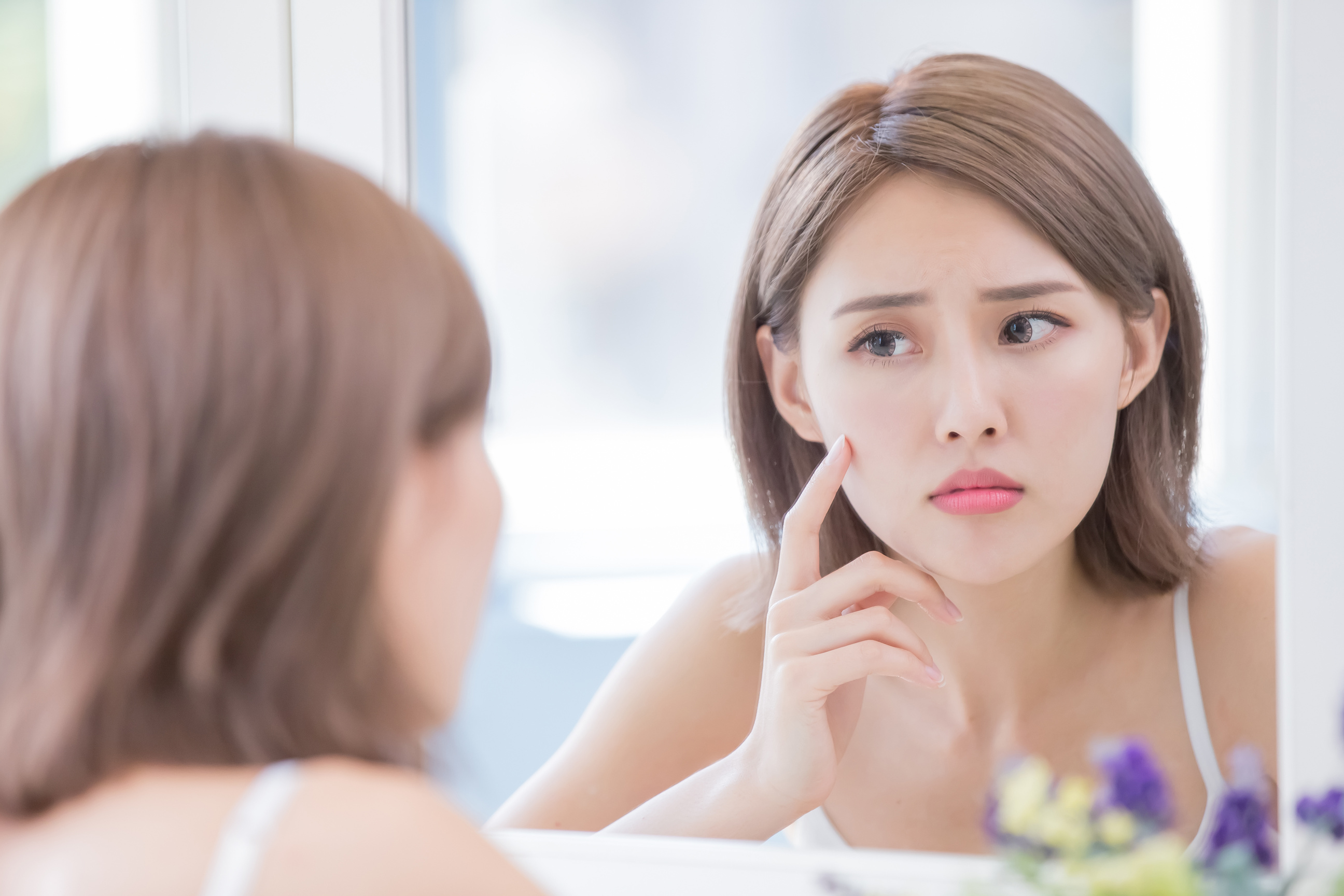 Woman with Acne Problem